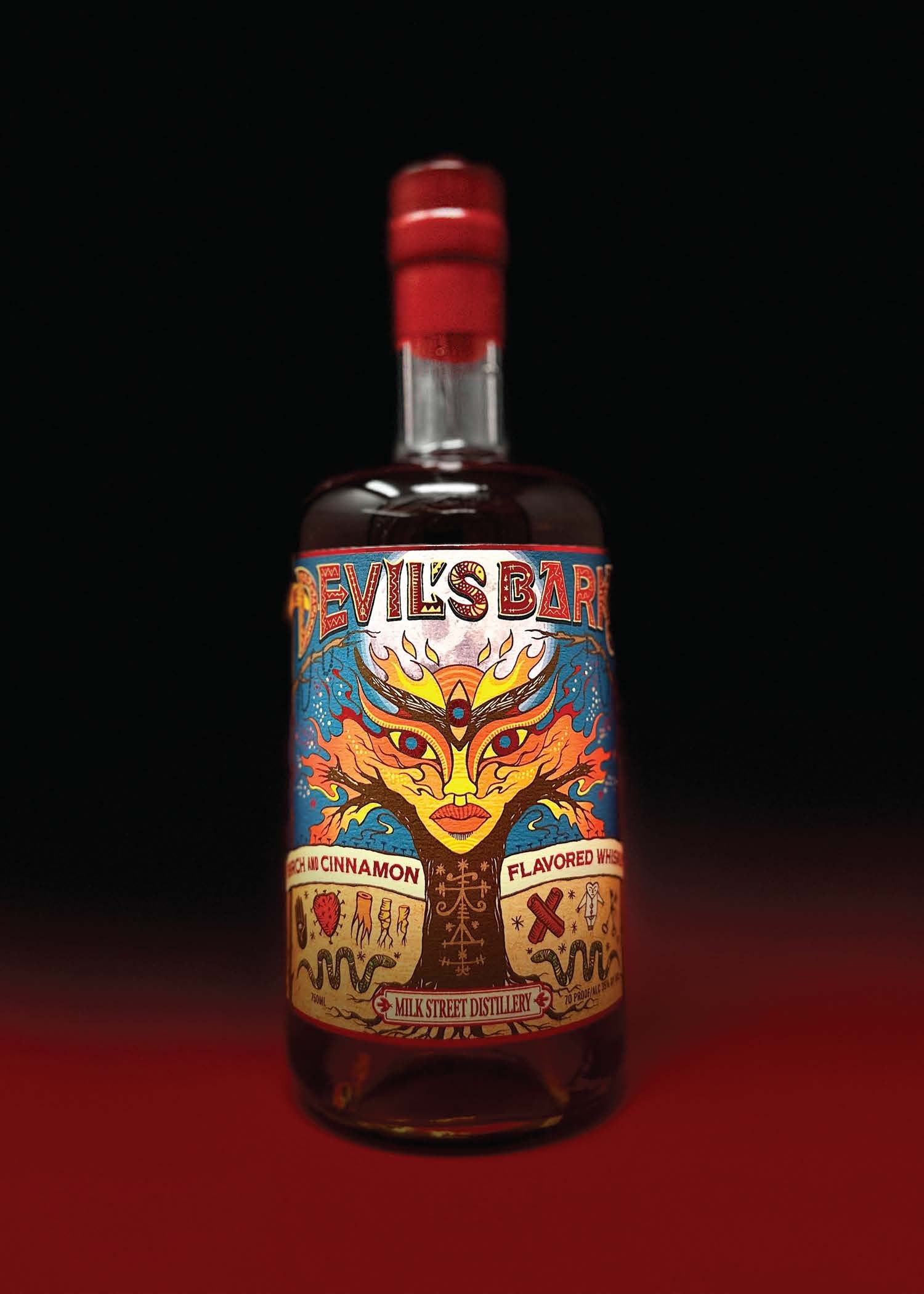 The Devil’s Bark bottle against a deep red ground.