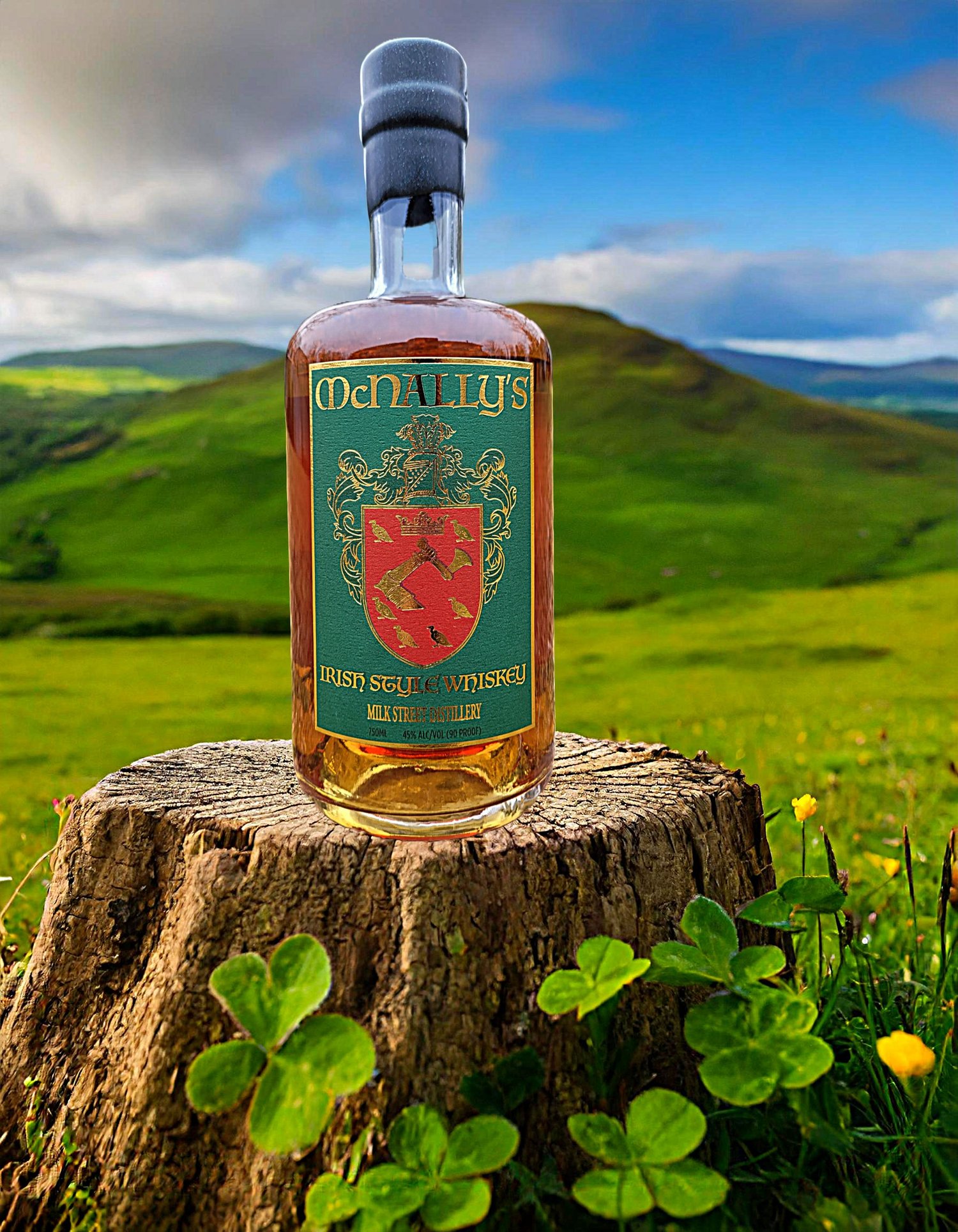 McNally’s bottle standing in a green field.